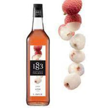 Load image into Gallery viewer, A bottle of 1883 Lychee syrup next to a depiction of lychee fruits.